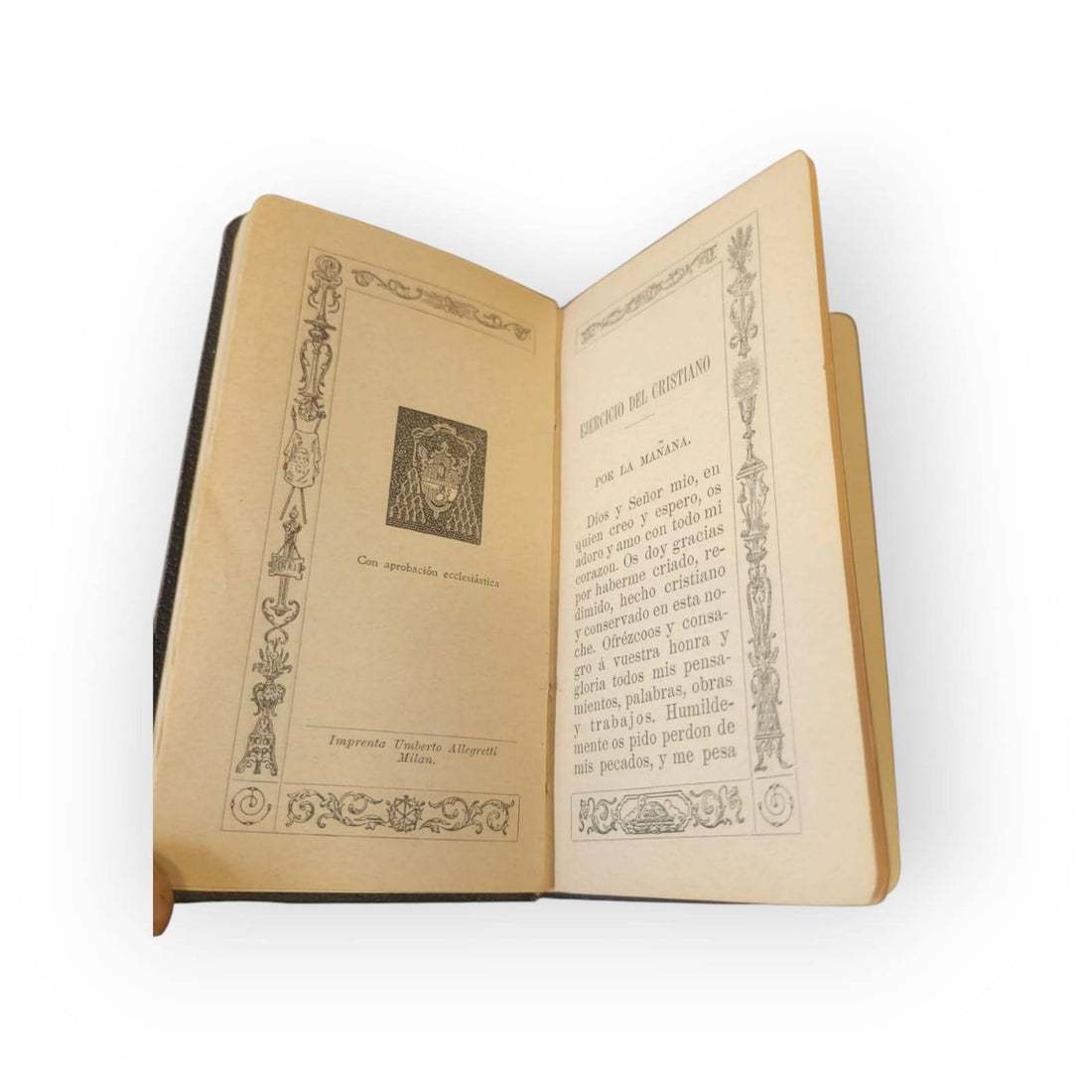 Portada del libro 'Dios Conmigo' con encuadernación púrpura y diseño religioso, parte de los libros de oraciones religiosas antiguos únicos y coleccionables.