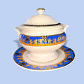 Sopera de porcelana decorada azul y oro con plato a juego