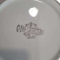 Sello de autenticidad de la vajilla Pontesa, porcelana de alta calidad fabricada en España. Marca reconocida por su elegancia y durabilidad.